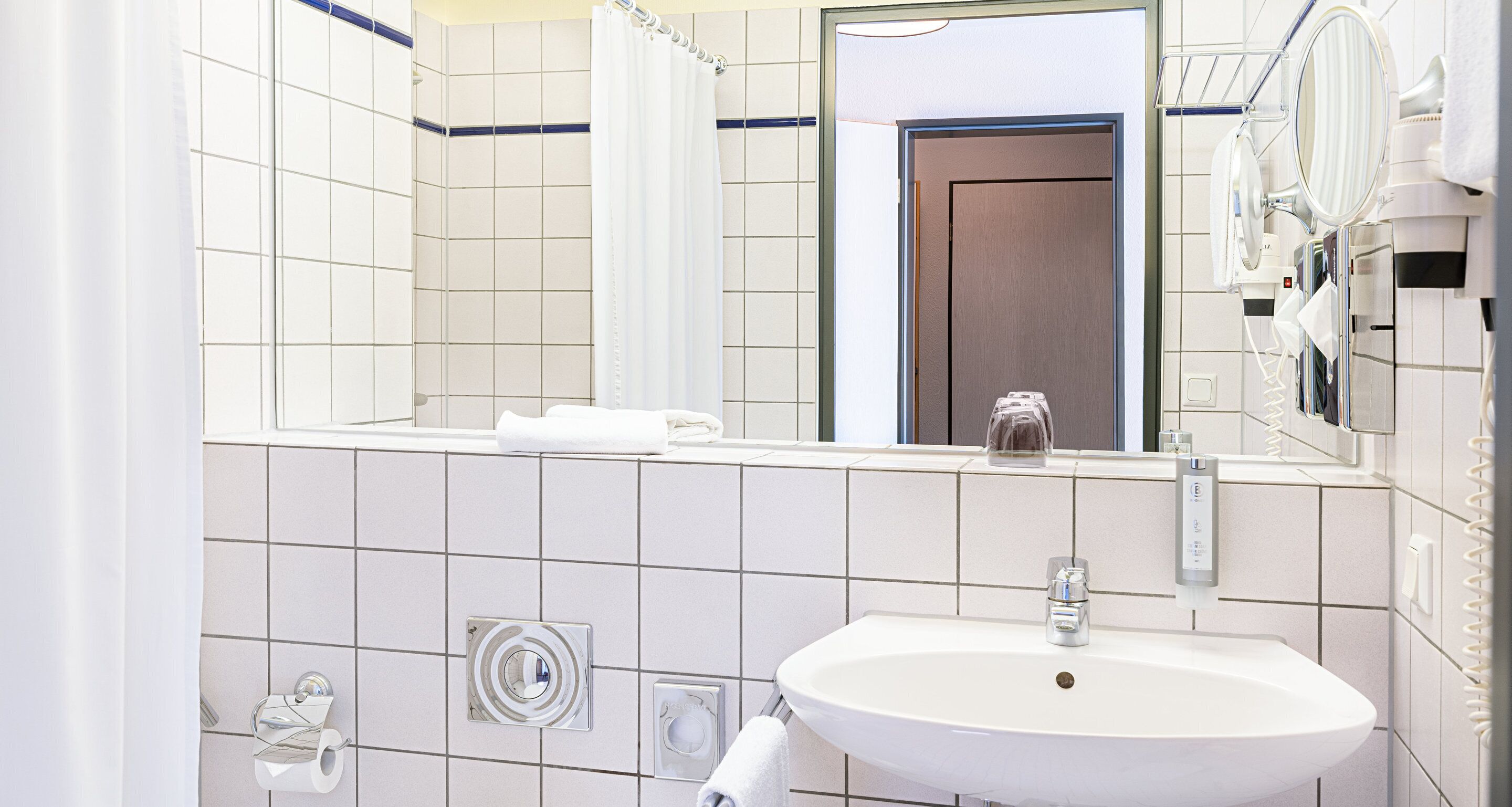 shower, eco-friendly toiletries, hair dryer, towels