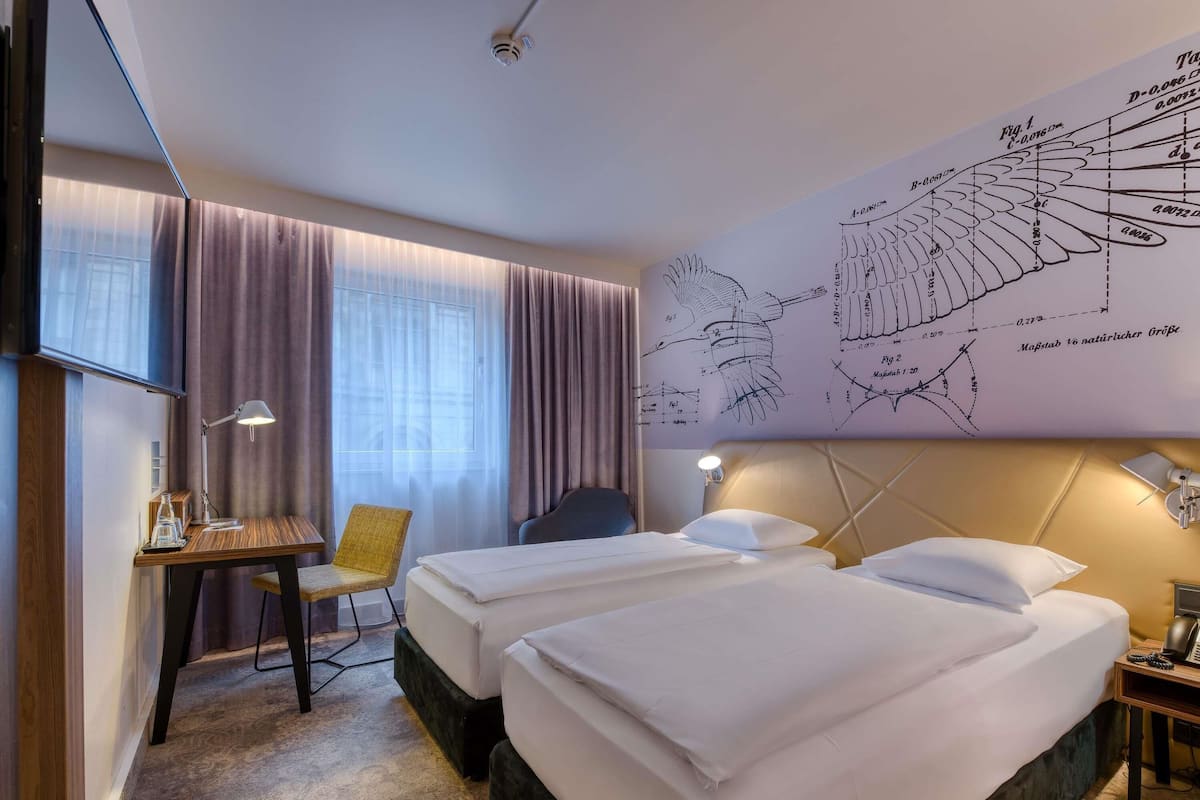 Twin Room, 2 Single Beds | Hypo-allergenic bedding, in-room safe, desk, blackout curtains