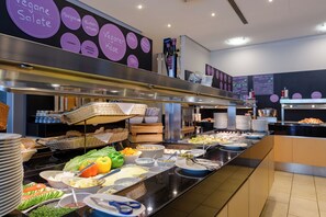 Daily buffet breakfast (EUR 23 per person)