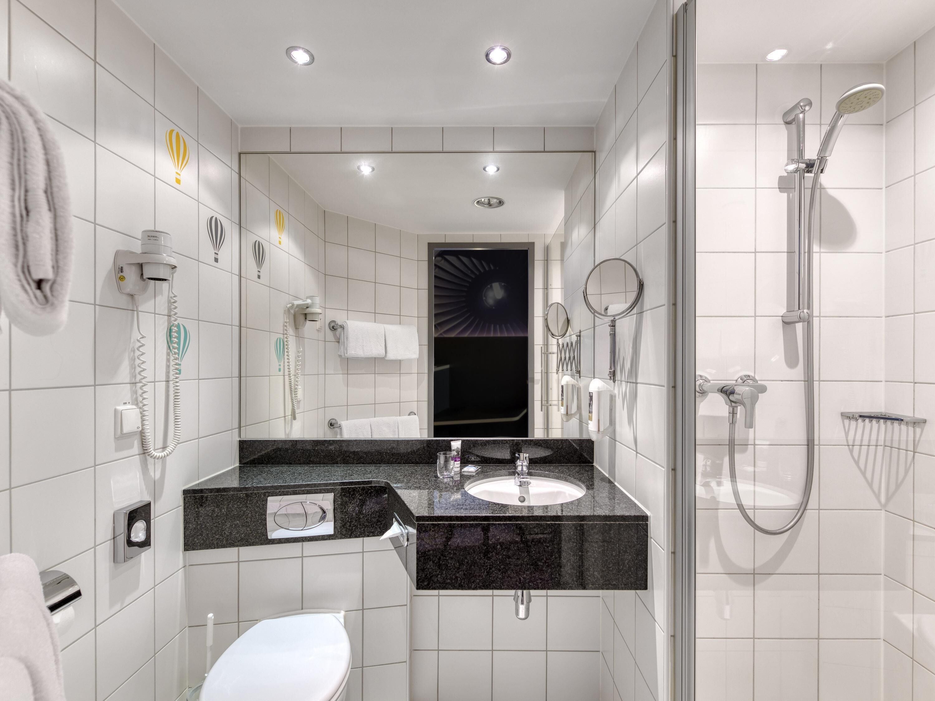 Premium bedding, down duvets, in-room safe, desk