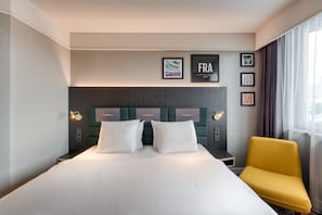 Premium bedding, down duvets, in-room safe, desk