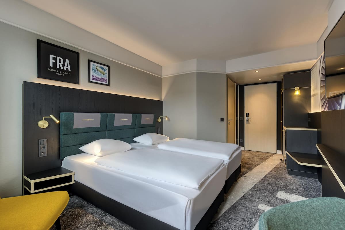 Premium bedding, down comforters, in-room safe, desk
