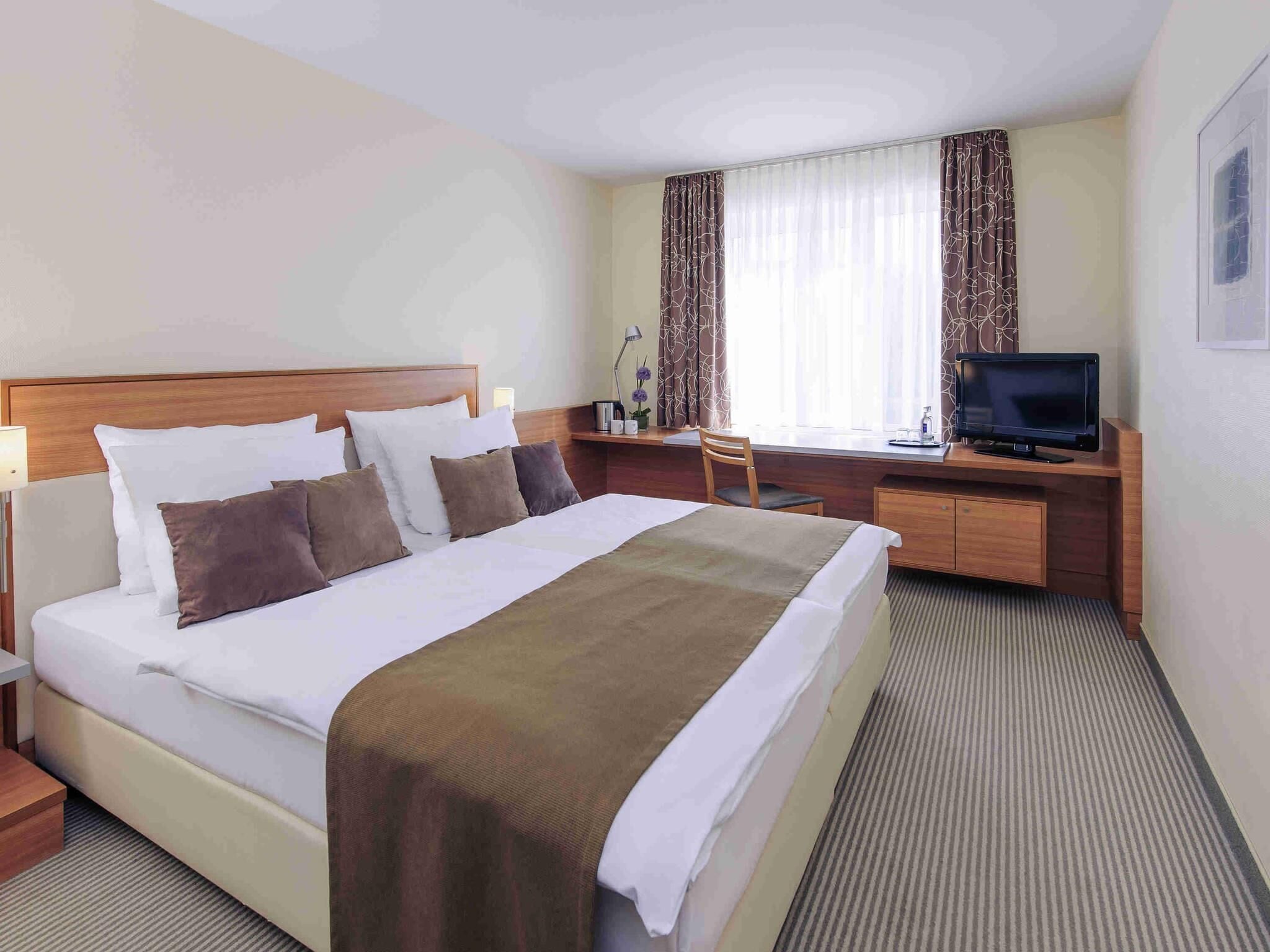 Desk, blackout drapes, soundproofing, iron/ironing board