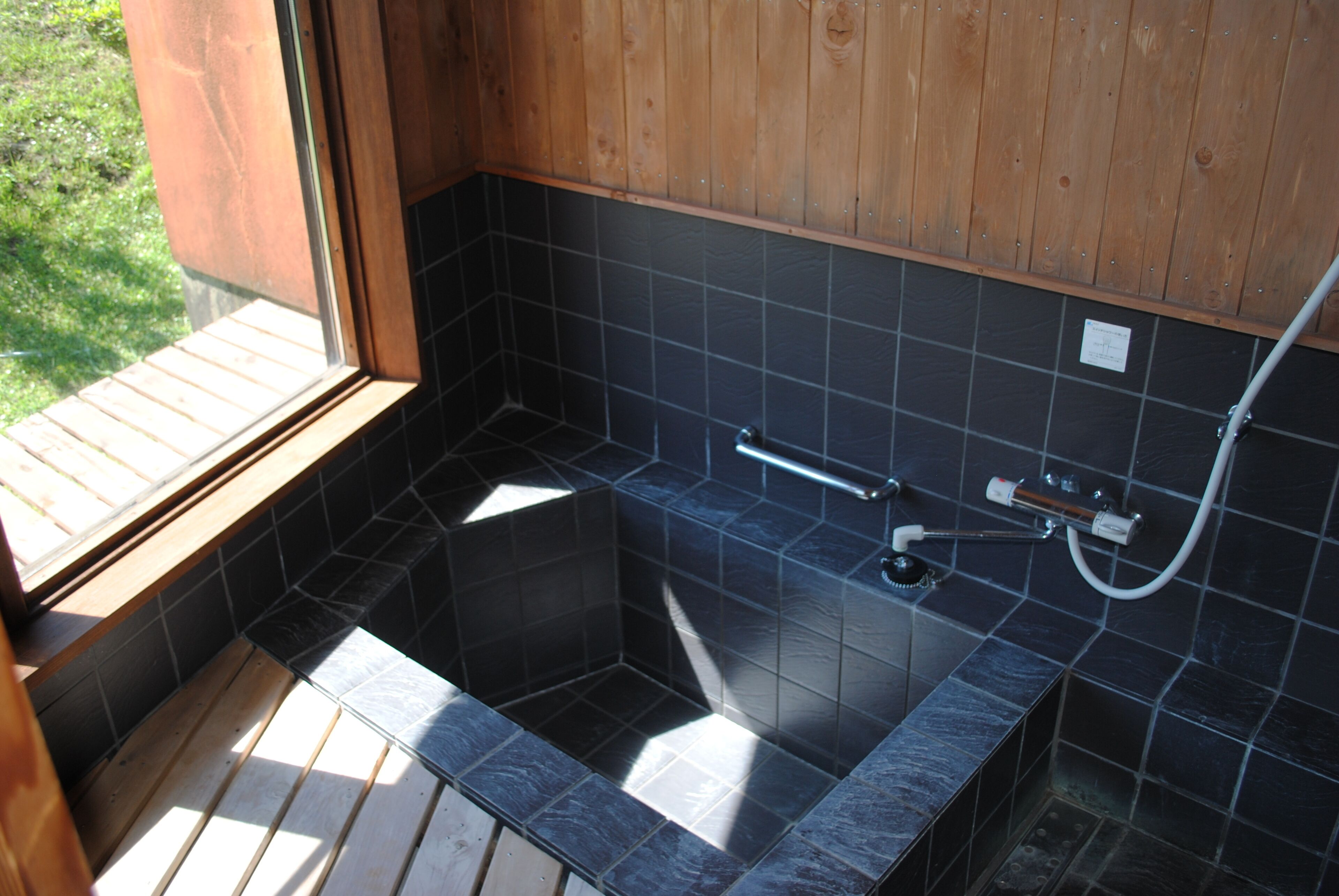 separate bathtub and shower, free toiletries, hair dryer, slippers