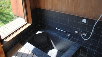 Separate tub and shower, free toiletries, hair dryer, slippers