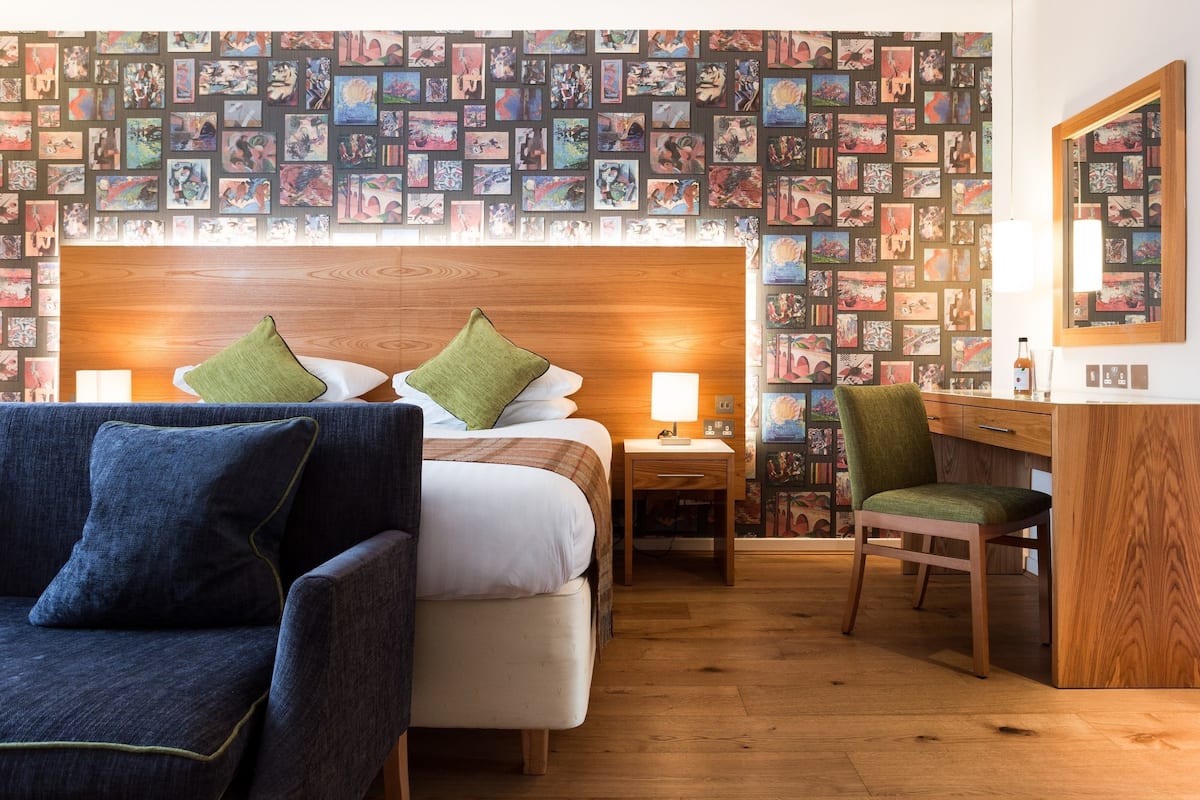 enviable double room | premium bedding, in-room safe, individually decorated, desk