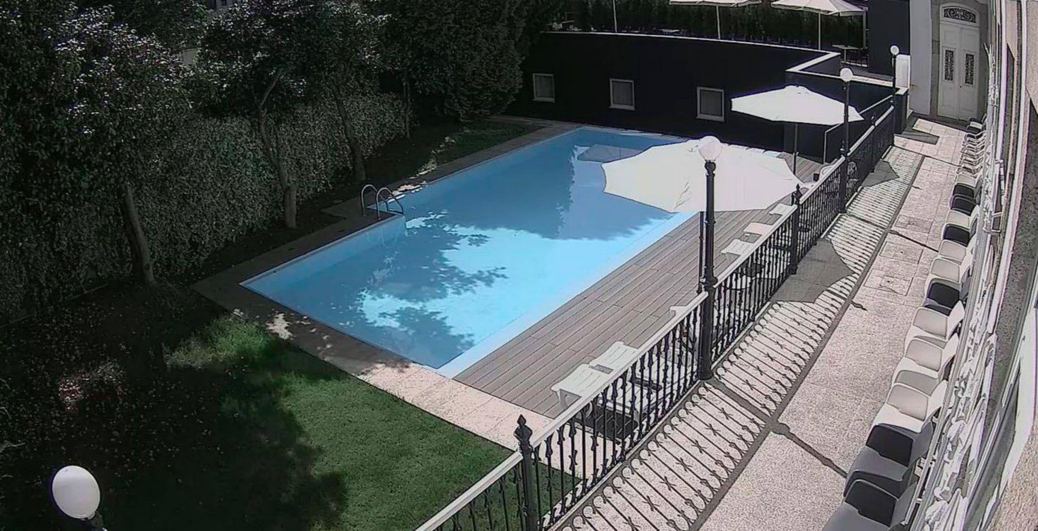 seasonal outdoor pool, pool umbrellas, pool loungers