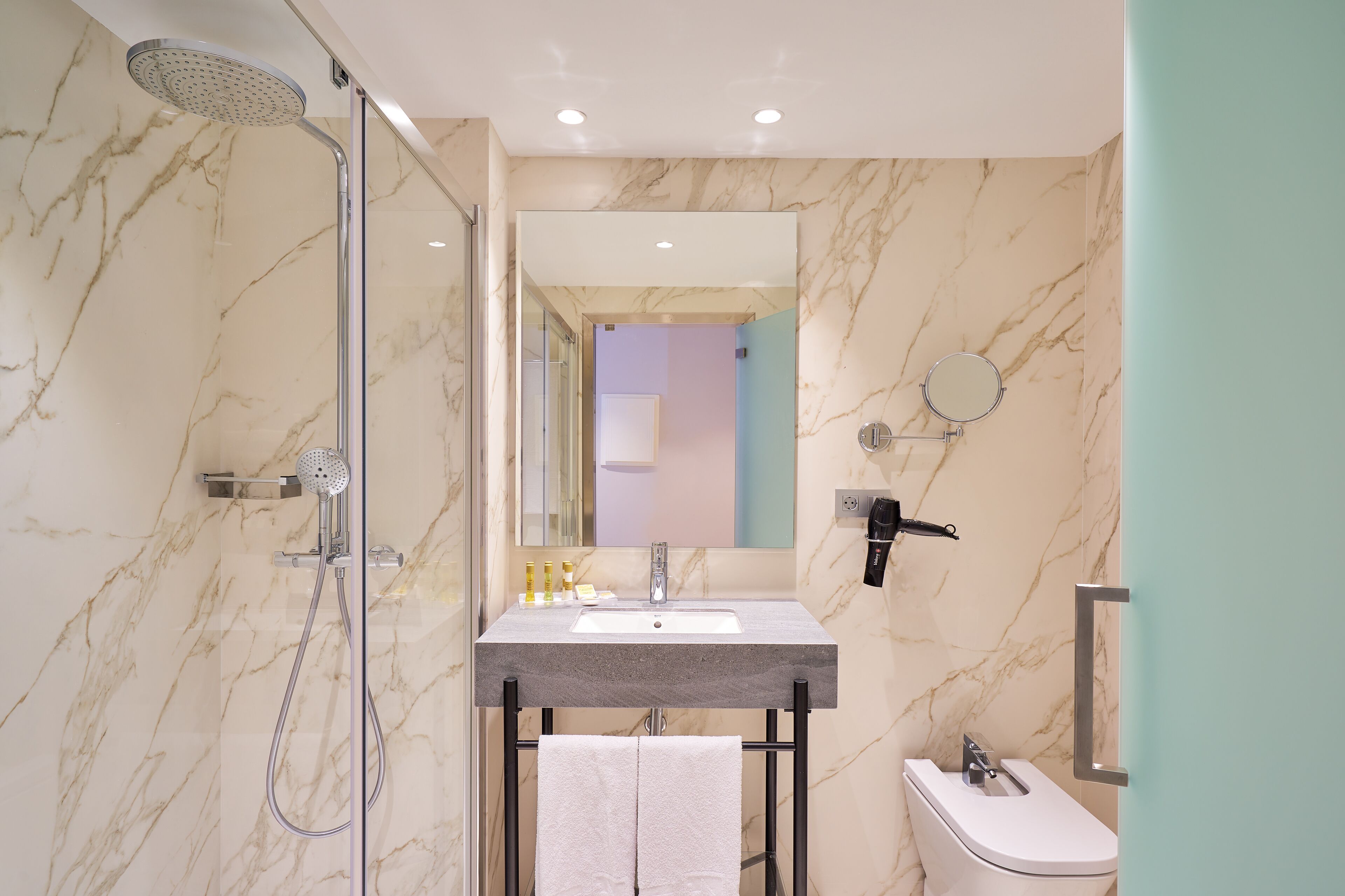 shower, eco-friendly toiletries, hair dryer, towels