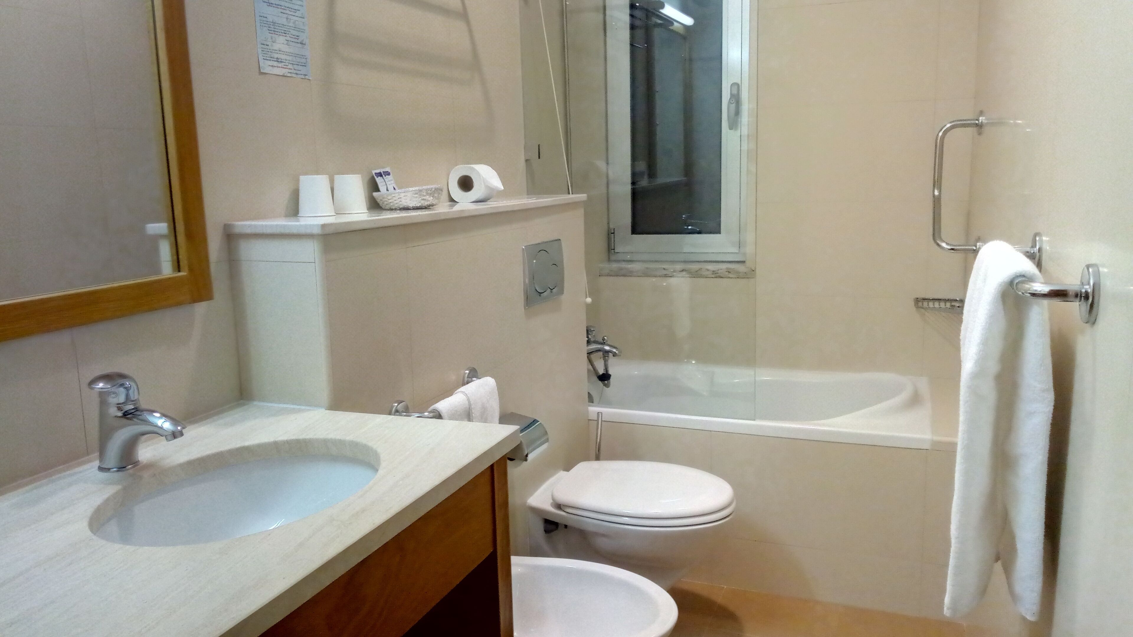 rainfall showerhead, hair dryer, towels, soap