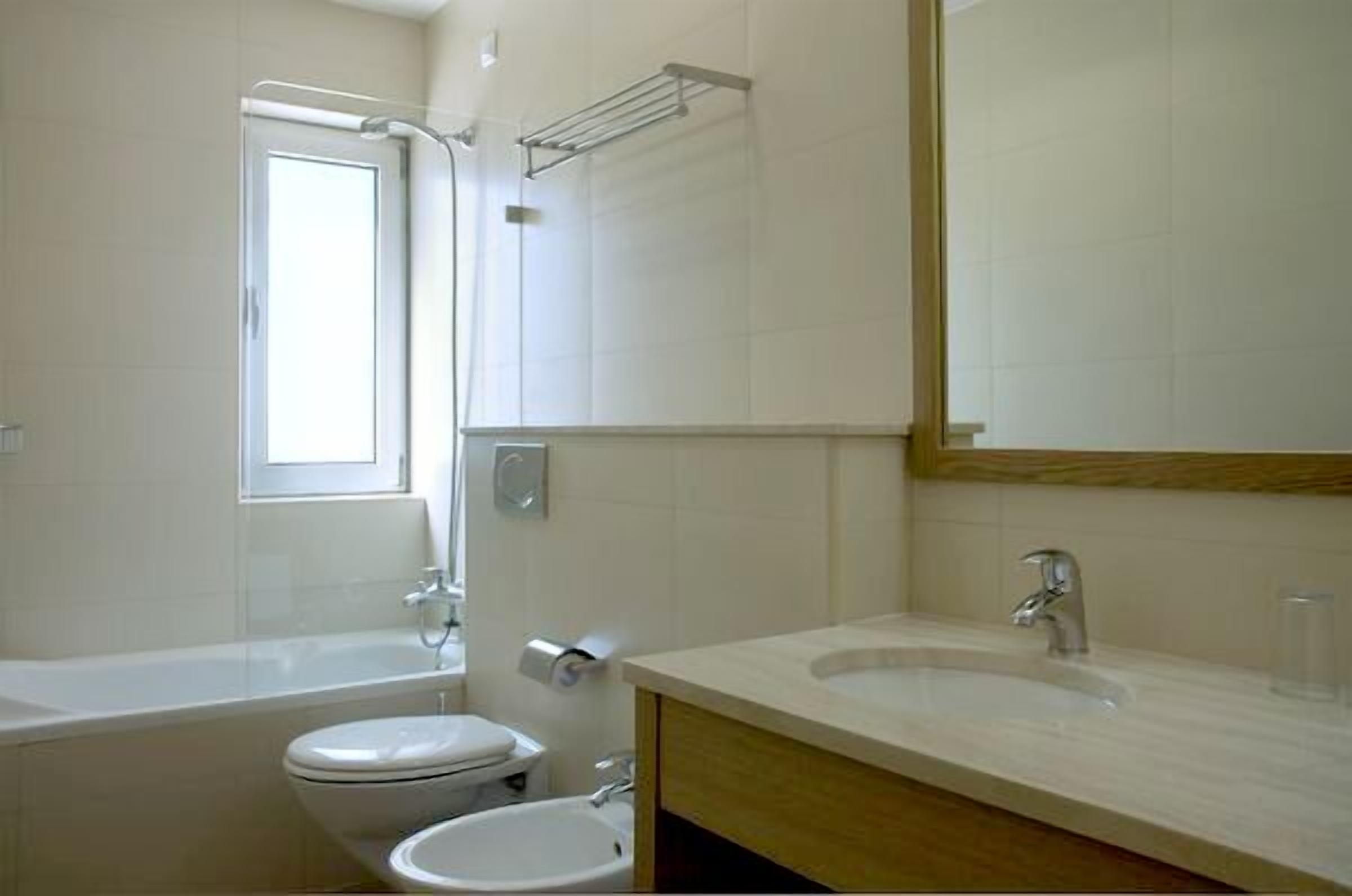 rainfall showerhead, hair dryer, towels, soap