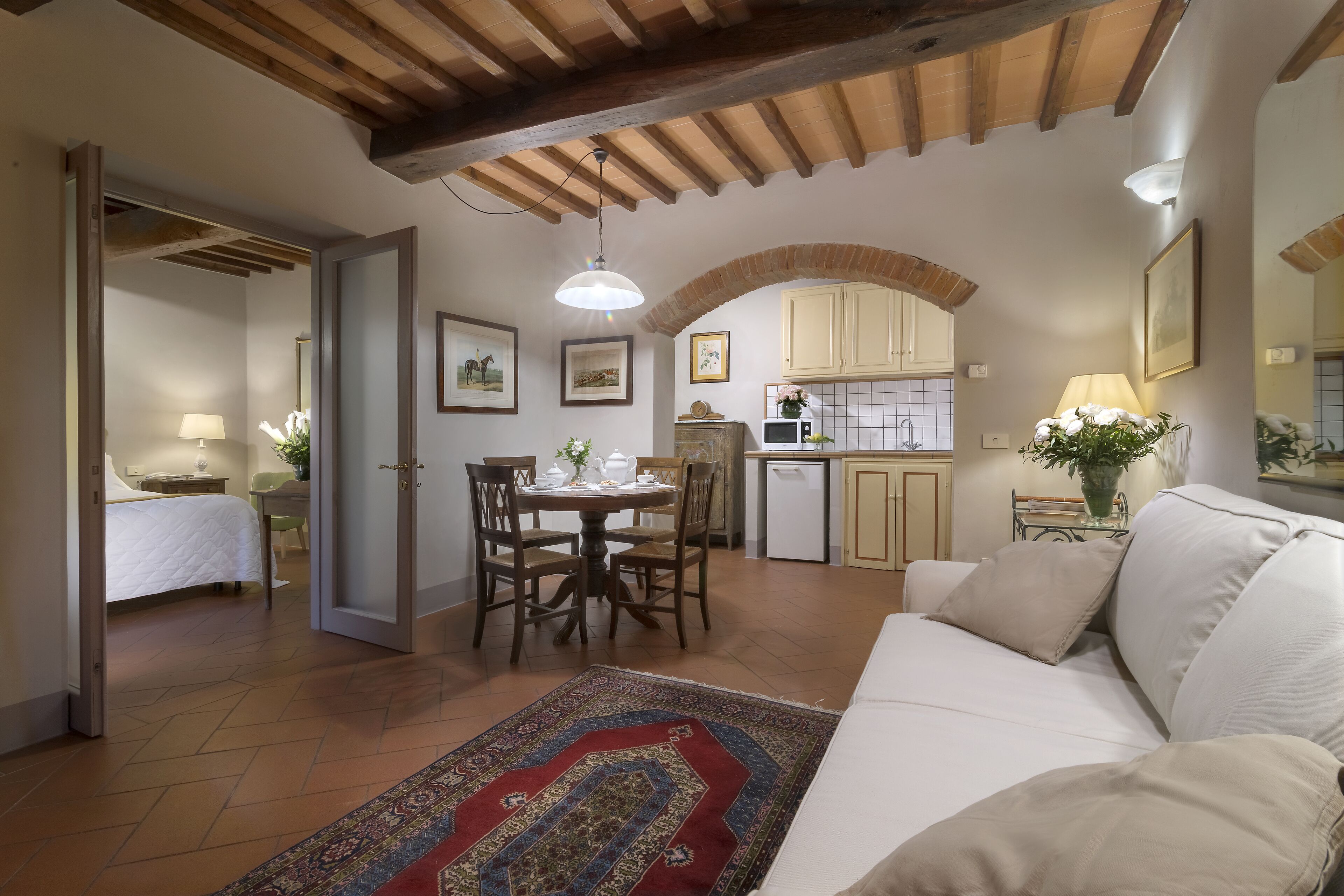 family room | 1 bedroom, minibar, in-room safe, desk