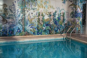 Indoor pool, seasonal outdoor pool, pool umbrellas, pool loungers