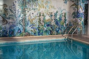 Indoor pool, seasonal outdoor pool, pool umbrellas, pool loungers