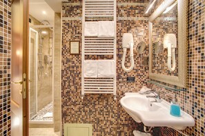 Shower, free toiletries, hair dryer, slippers