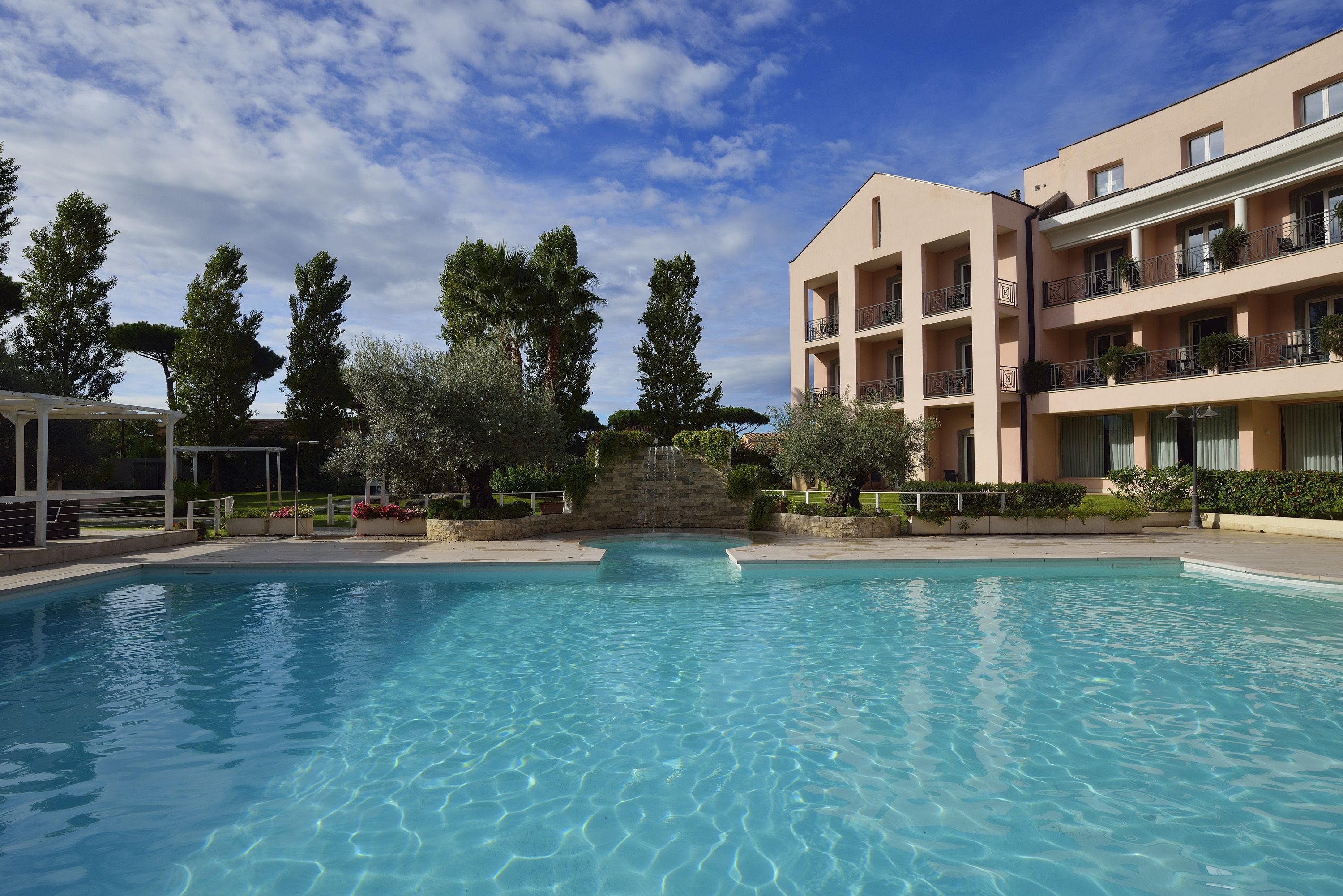 seasonal outdoor pool, pool umbrellas, pool loungers