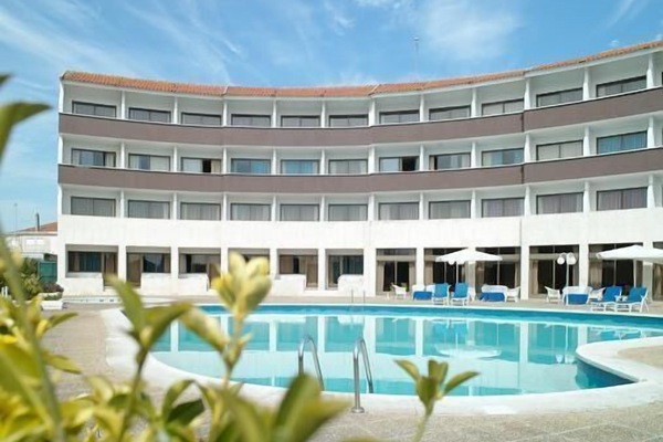 Seasonal outdoor pool, open 9:00 AM to 8:00 PM, pool umbrellas