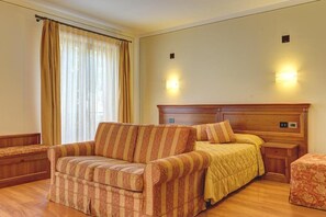Family Room, Balcony | Select Comfort beds, soundproofing, WiFi, bed sheets