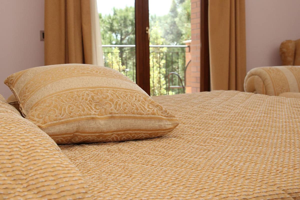 Quarto triplo superior | Camas Select Comfort, quartos à prova de som, Wi-Fi (sobretaxa)