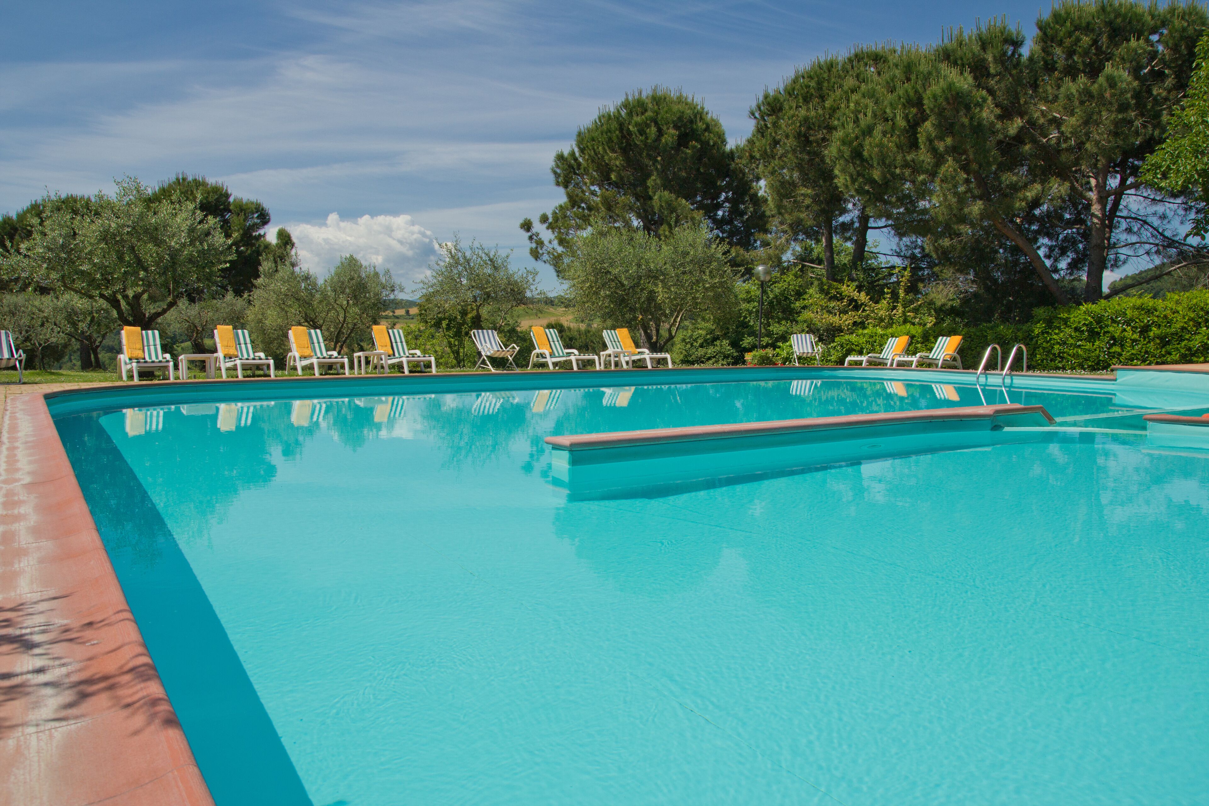 seasonal outdoor pool, open 10:00 am to 7:00 pm, pool umbrellas