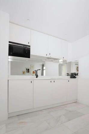 Fridge, microwave, coffee/tea maker, electric kettle