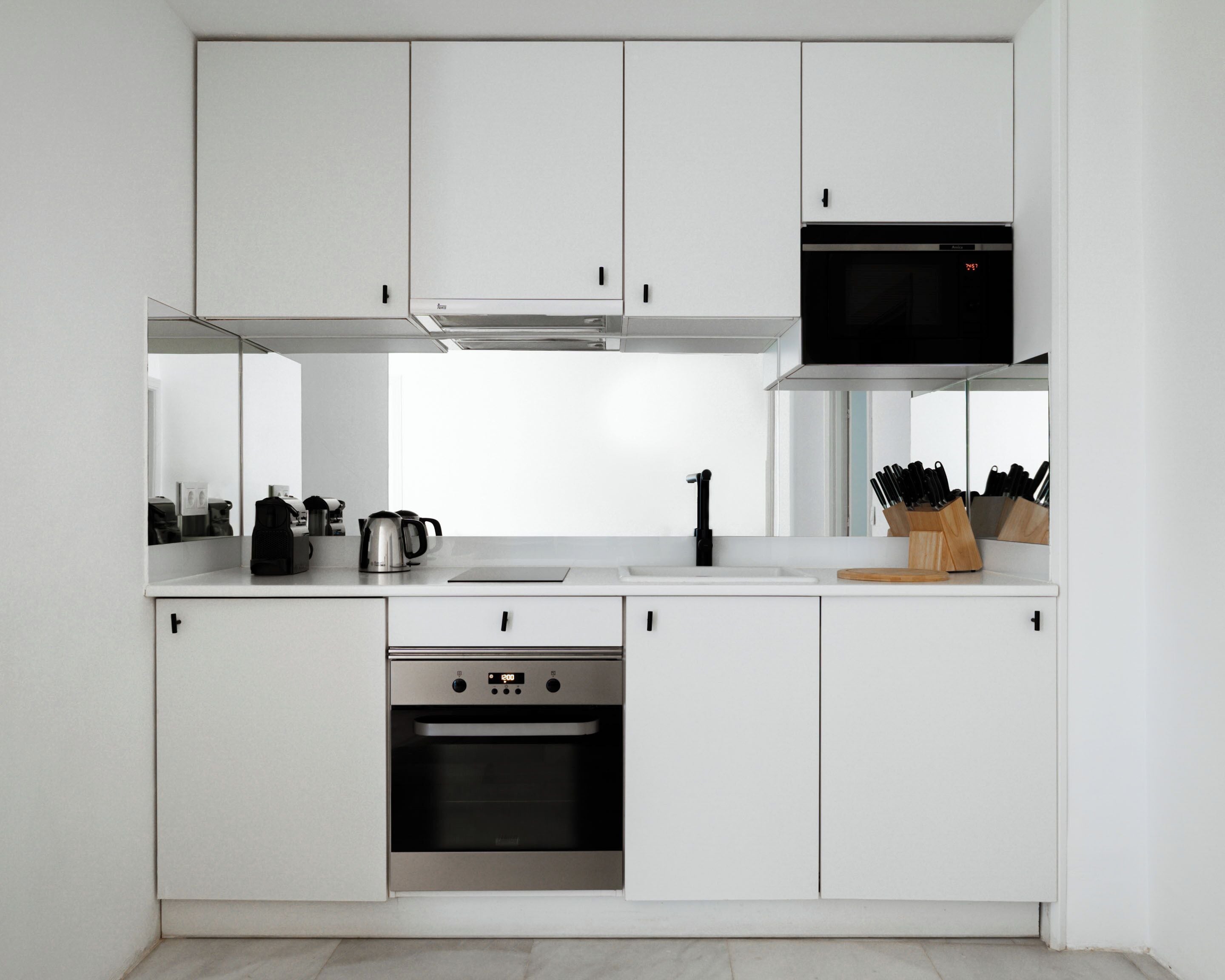 Apartamento, 2 quartos, chuveiro com barras de apoio | Cozinha privada | Geladeira, micro-ondas, cooktop, máquina de café expresso