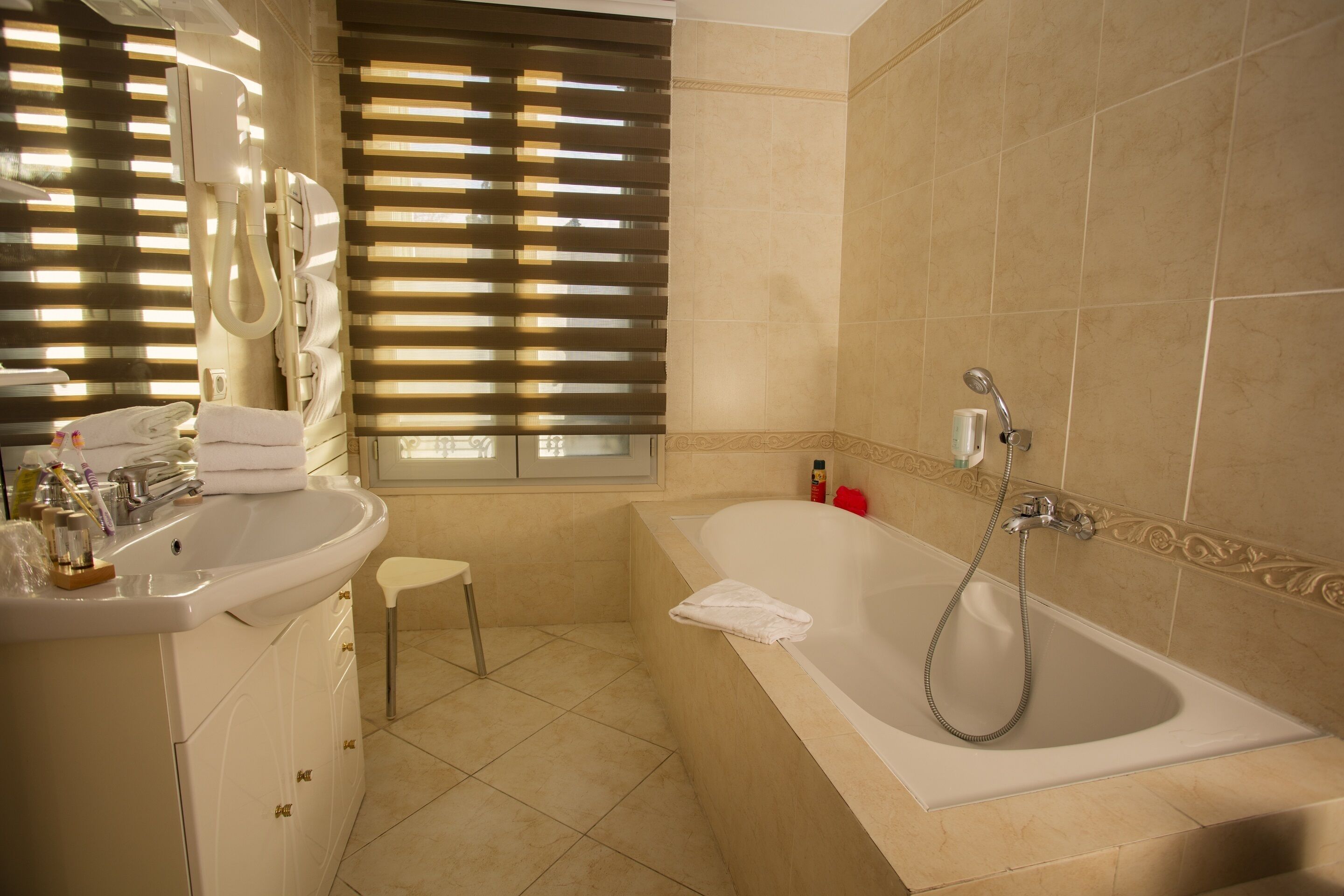 family room | bathroom | free toiletries, hair dryer, towels