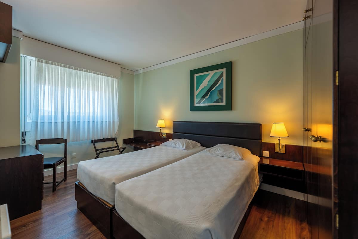 Blackout curtains, soundproofing, iron/ironing board (on request)