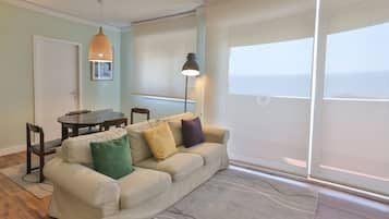 Superior Apartment, 1 Bedroom, Ocean View | Living room | LCD TV