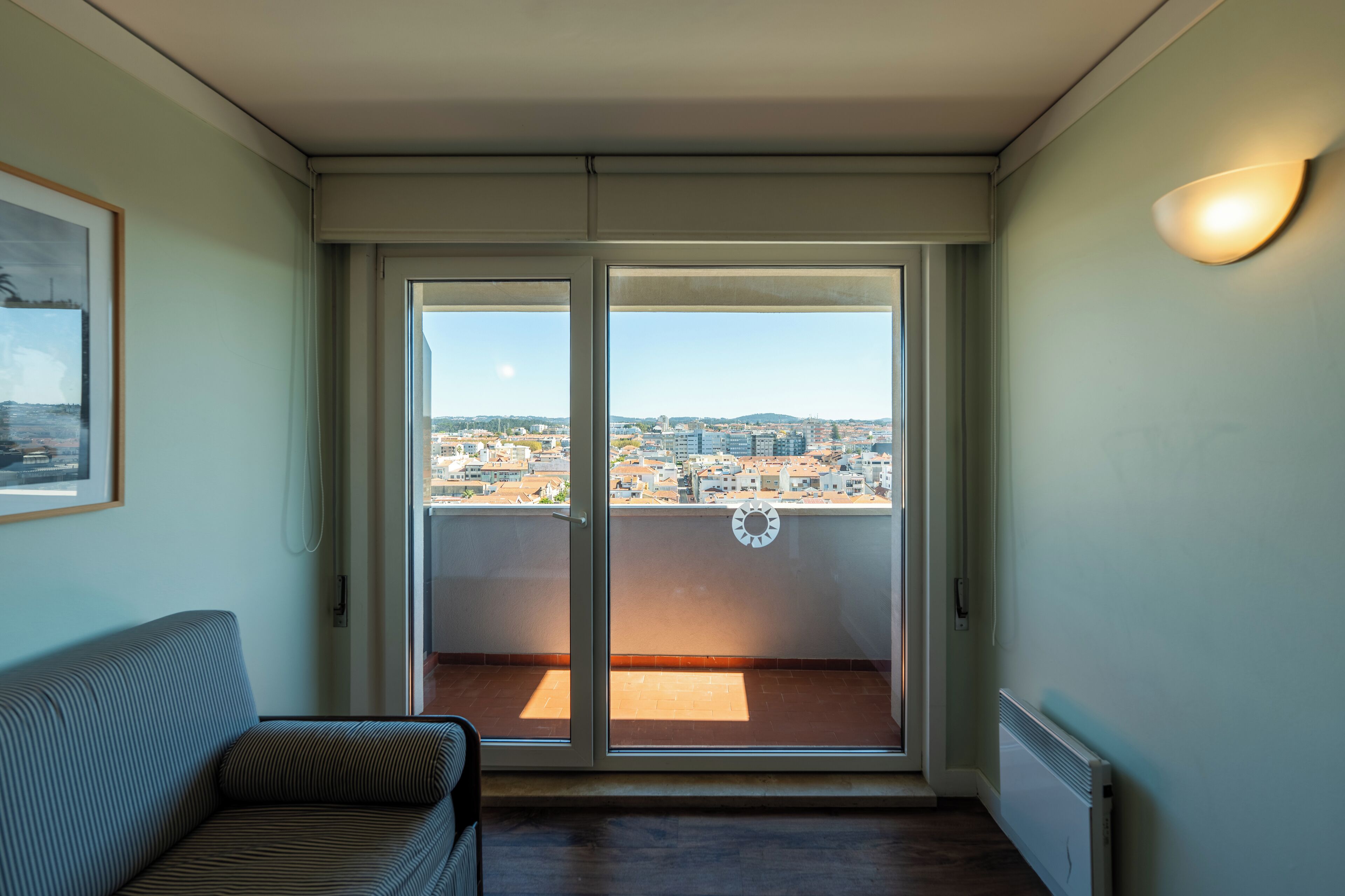 Apartment, 1 Bedroom, City View | Blackout curtains, soundproofing, iron/ironing board