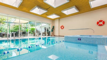 Indoor pool, open 8:00 AM to 9:00 PM, pool loungers