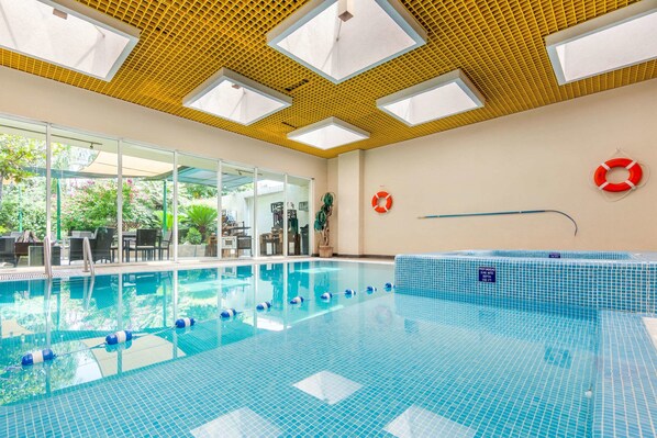 Indoor pool, open 8:00 AM to 9:00 PM, sun loungers