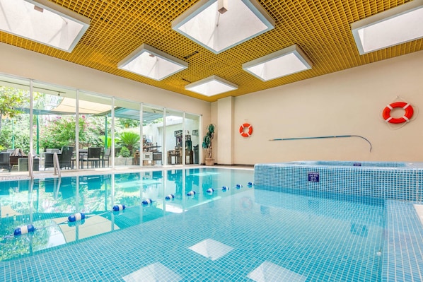 Indoor pool, open 8:00 AM to 9:00 PM, sun loungers