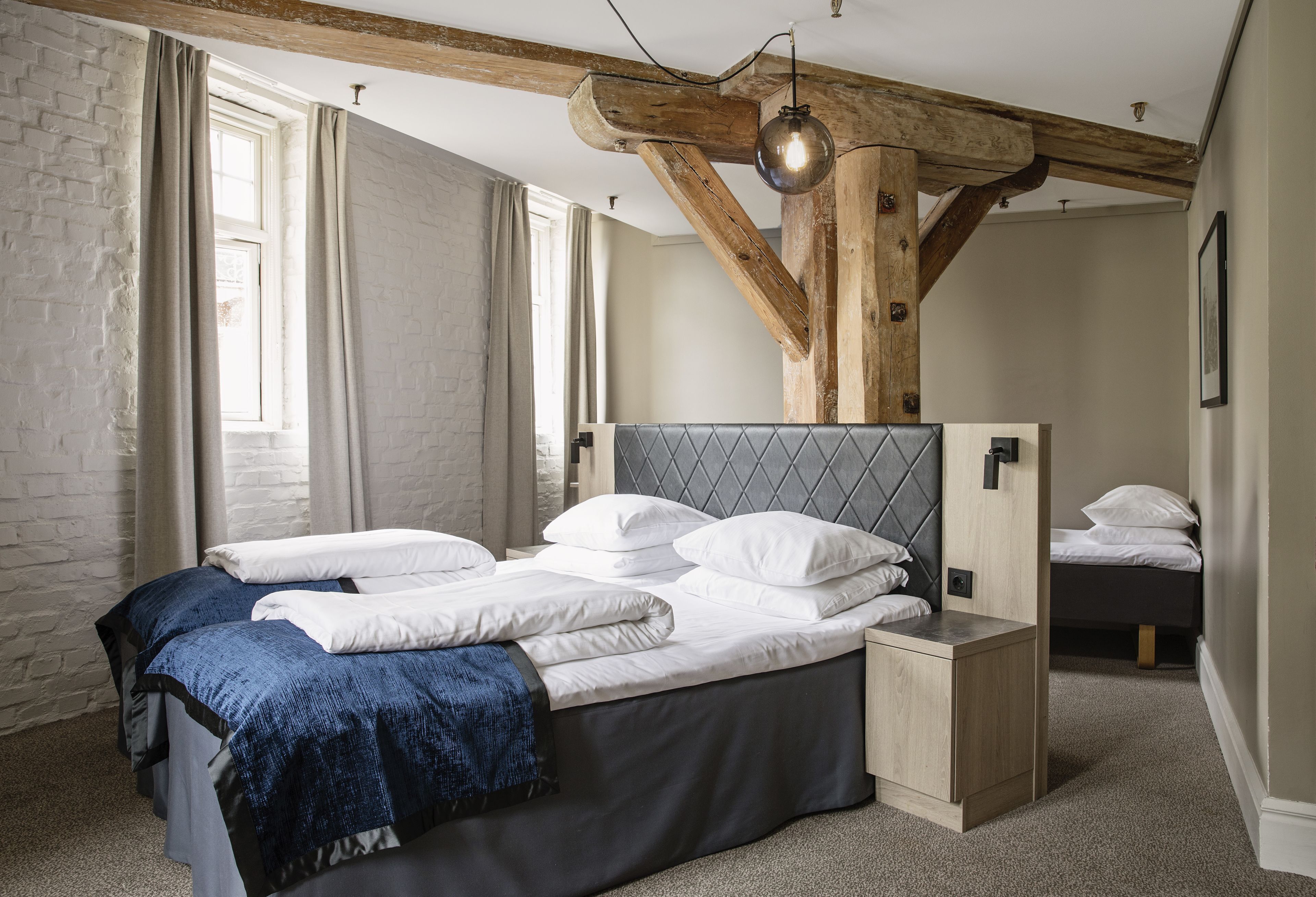 Pillowtop beds, desk, laptop workspace, free WiFi