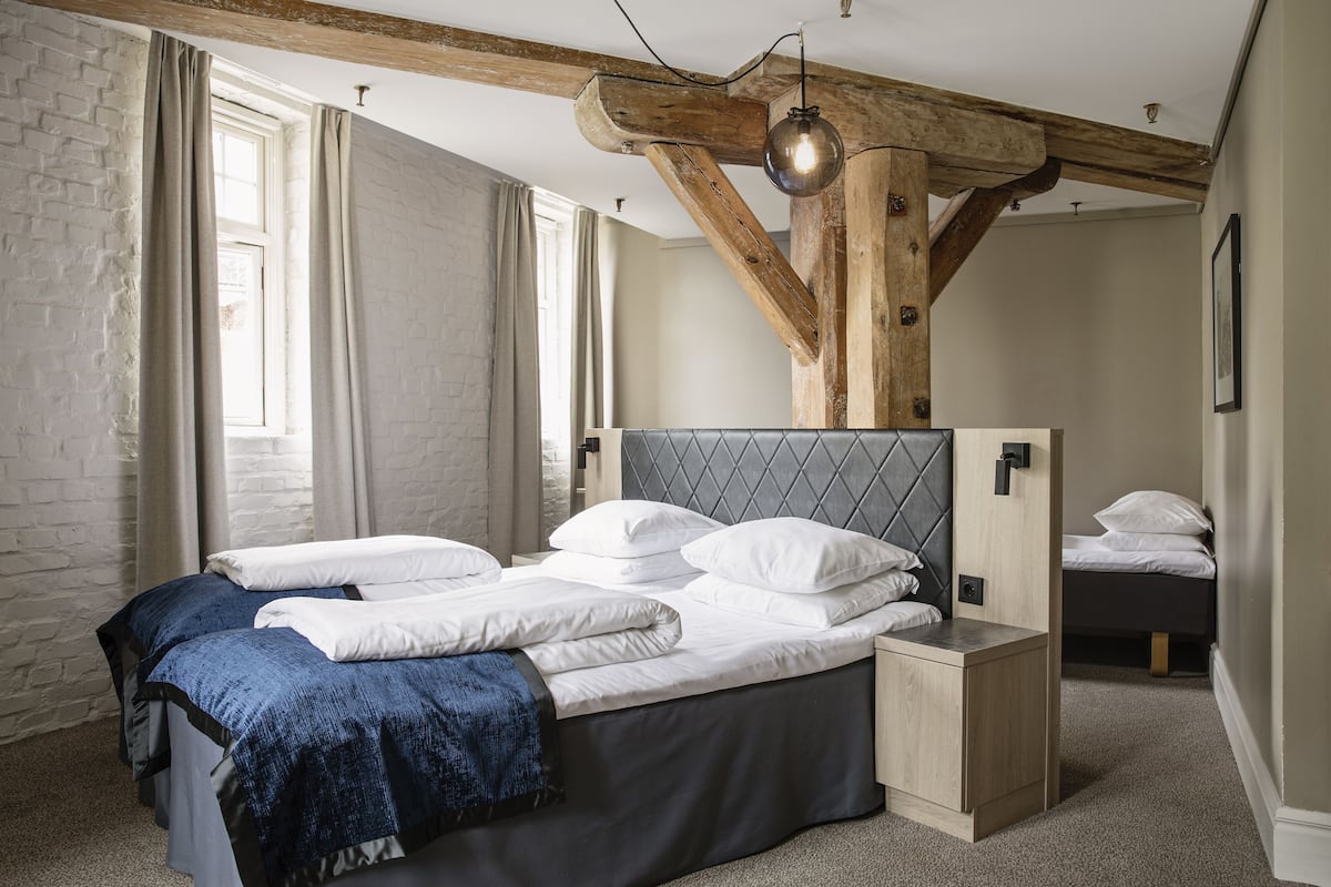 Pillowtop beds, desk, laptop workspace, free WiFi