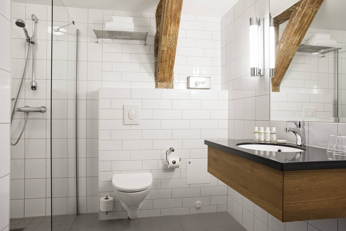 family room | bathroom | shower, hair dryer, towels