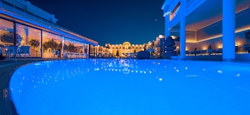 Seasonal outdoor pool, pool umbrellas, pool loungers