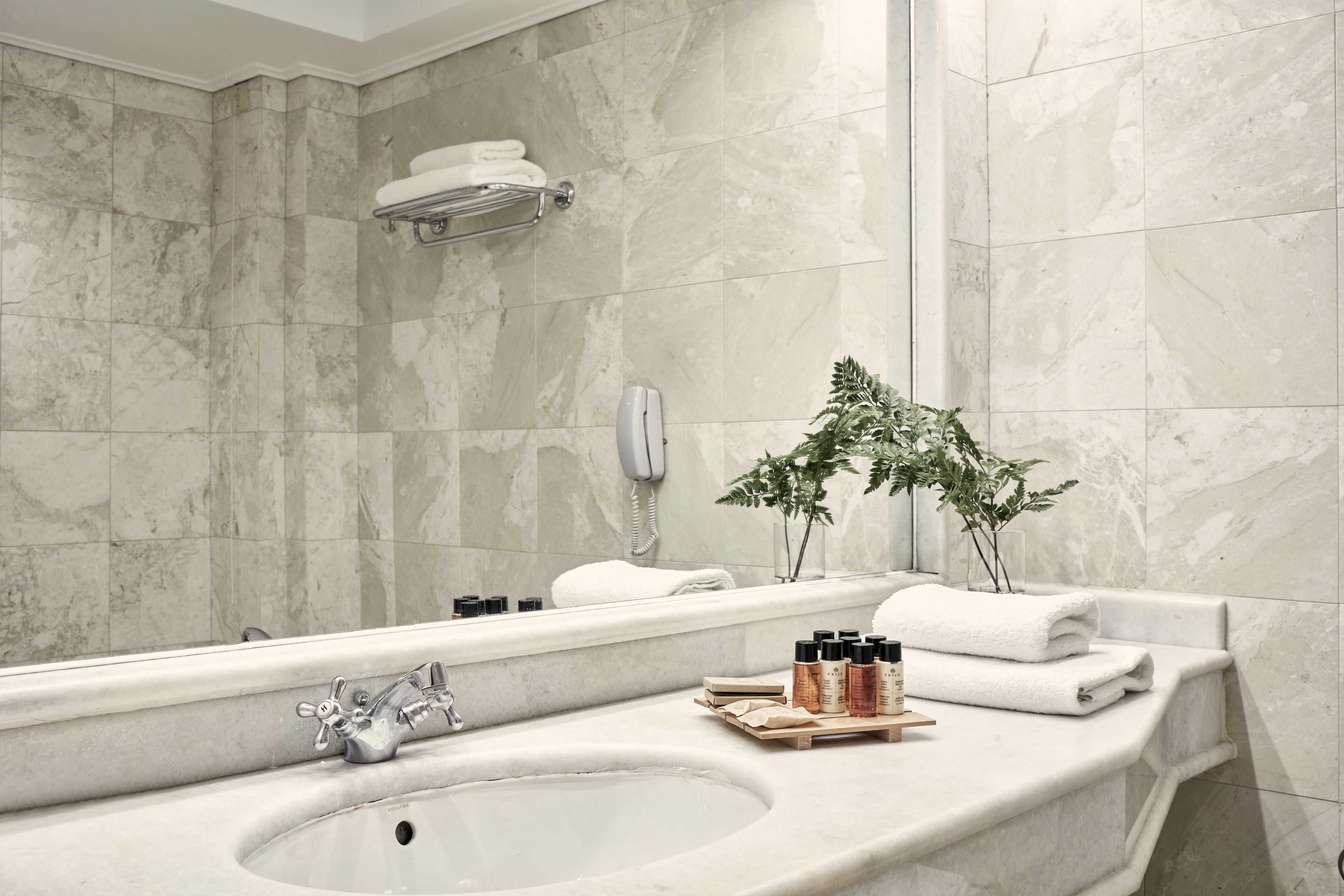 premium room, pool view (classic) | bathroom | deep-soaking bathtub, designer toiletries, hair dryer, bathrobes