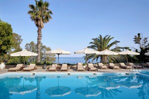 Outdoor pool, pool umbrellas, pool loungers