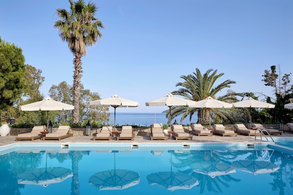 Outdoor pool, pool umbrellas, pool loungers