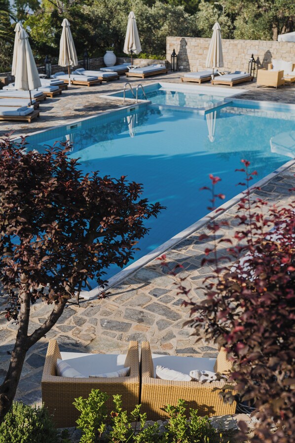 Outdoor pool, pool umbrellas, pool loungers