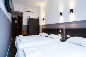 Chambre Quadruple | Coffres-forts dans les chambres, Wi-Fi, draps fournis