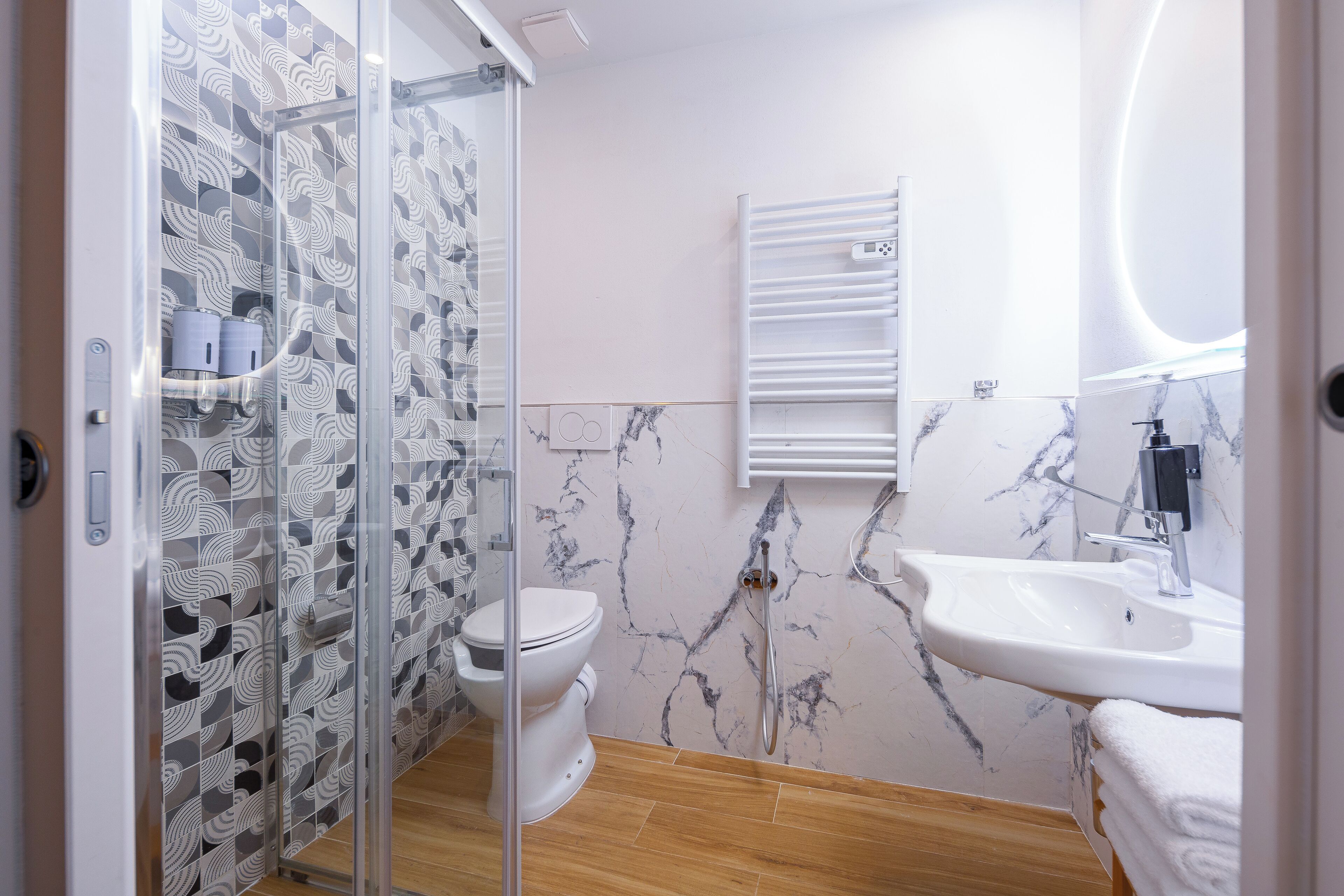 shower, hair dryer, bathrobes, bidet