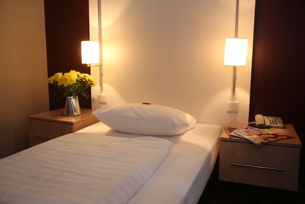 Einzelzimmer | Zimmersafe, Schreibtisch, schallisolierte Zimmer, Babybetten