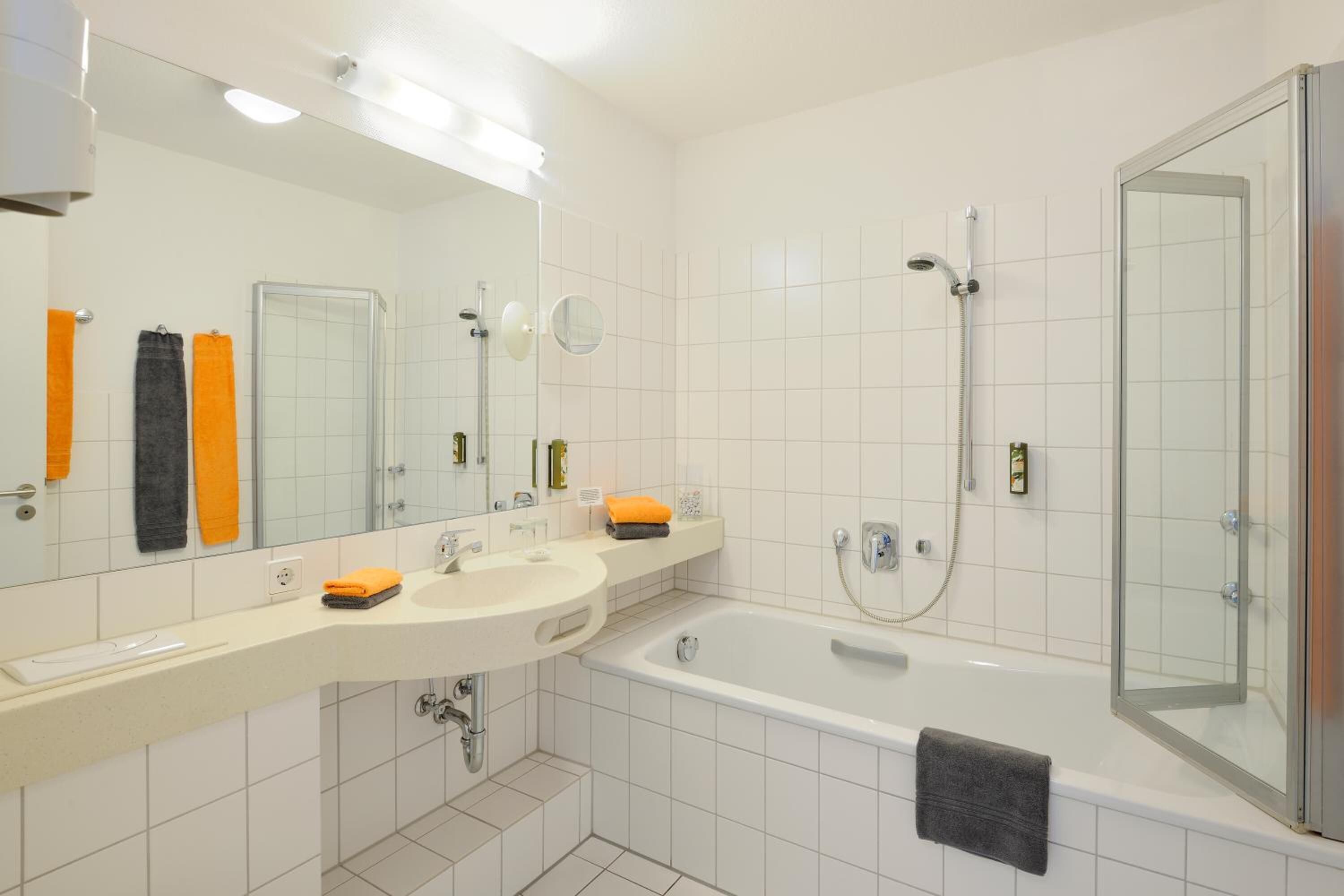 shower, free toiletries, hair dryer, towels