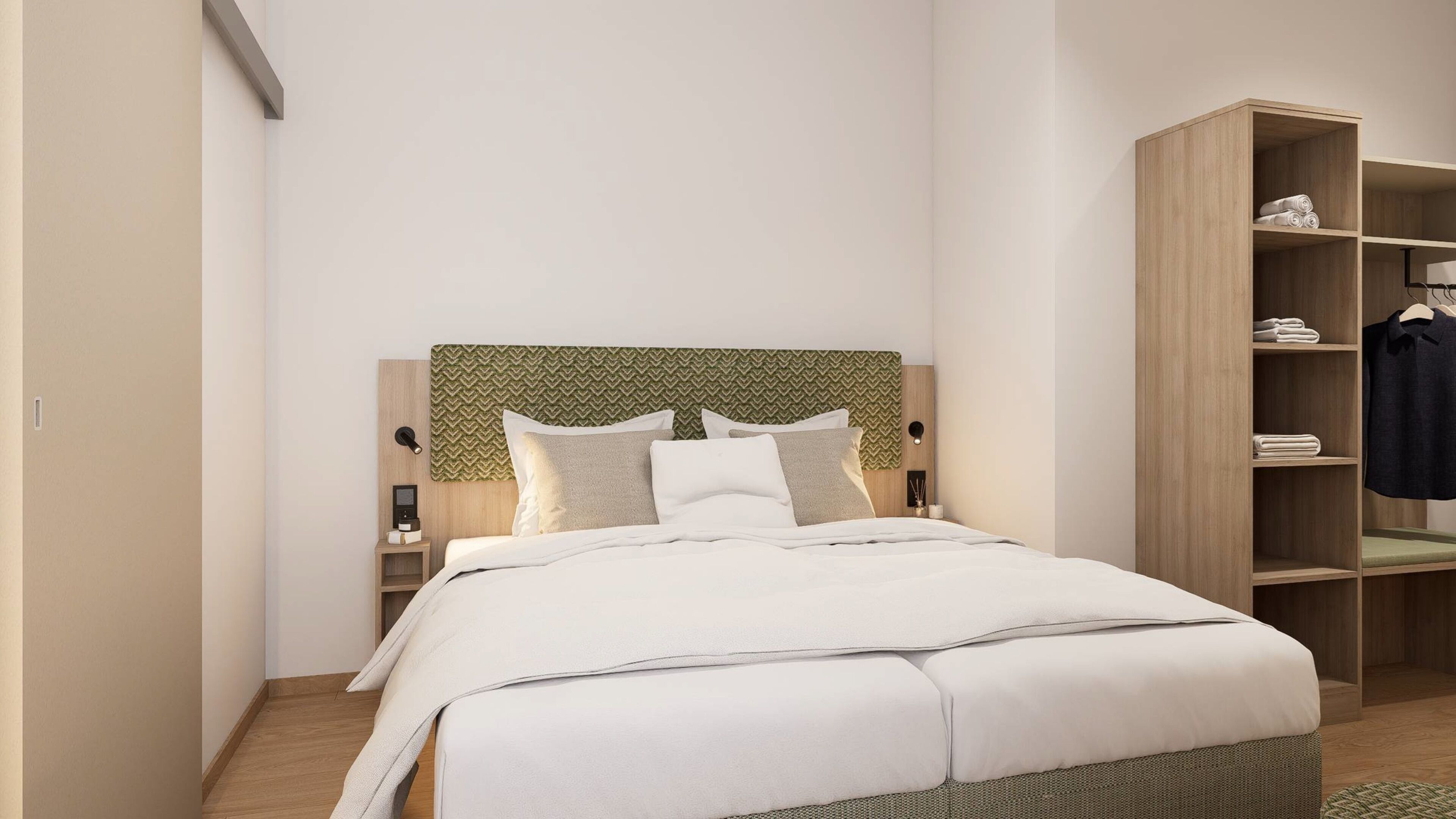 A modern bedroom with a bed, a wooden headboard, a nightstand, and a wardrobe.