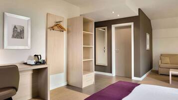Hypo-allergenic bedding, desk, blackout drapes, soundproofing