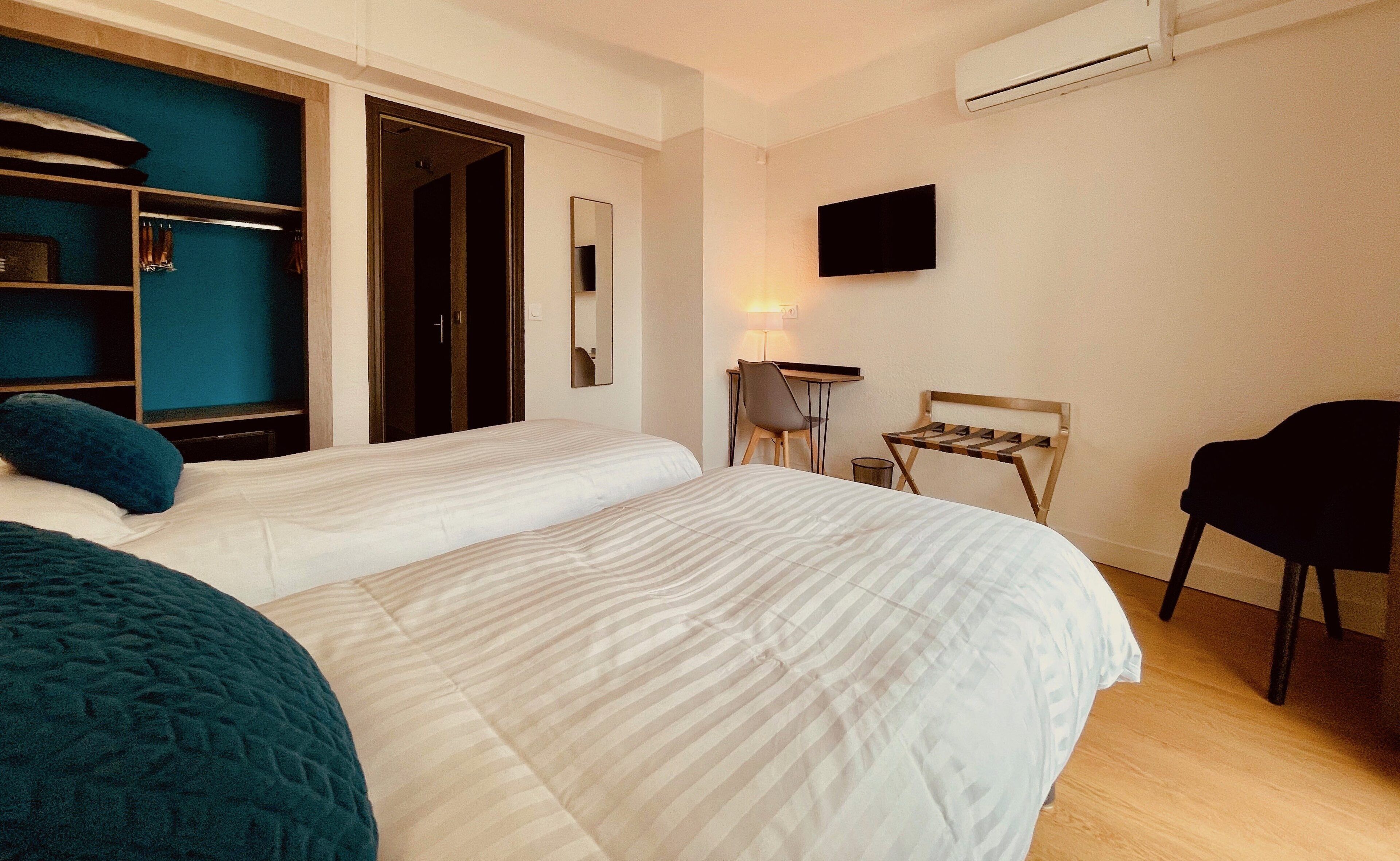 Twin Room Courtyard View | In-room safe, individually decorated, individually furnished