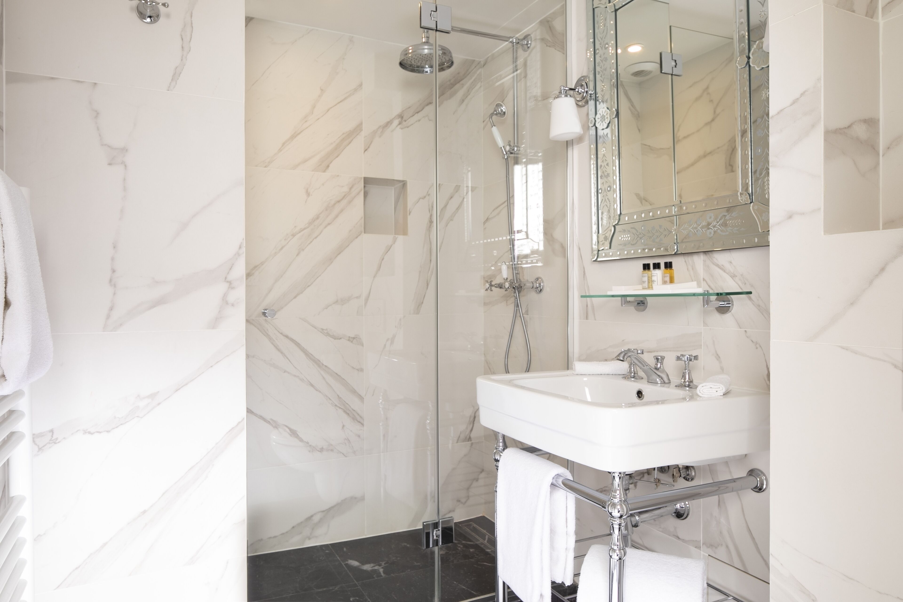 superior double room | bathroom | shower, free toiletries, hair dryer, towels