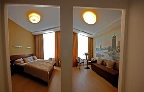 Deluxe Suite | Minibar, in-room safe, iron/ironing board, free cribs/infant beds - At The Old Lady (Prague)
