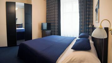 Double Room | Minibar, in-room safe, desk, iron/ironing board